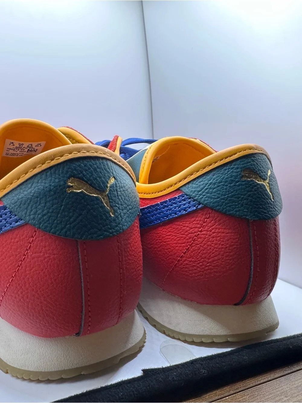 Puma Kids Red Sneakers with Blue Accents